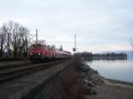 218 456-2 kurz nach Verlassen von Lindau Hbf mit IRE 4214 nach Ulm am 20.03.2010.