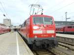 111 040-2 steht hier mit ihrem angekommenen RE im Mnchner Hbf, 23.Mai 2013.