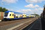 DABpbzkfa mit 146 522-8 der metronom Eisenbahngesellschaft mbH mit der Anzeige  Nicht einsteigen  durchfährt den Bahnhof Radbruch auf der Bahnstrecke Hannover–Hamburg (KBS 110). [6.7.2017 - 16:07 Uhr]