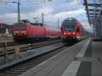 429 029 kam,am 17.Dezember 2011,mit dem RE 13010 aus Sassnitz in Rostock an,whrend links 143 952 wartete.