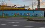 <U>Lichtspiele in Singen am Hohentwiel.</U> 

Grafito an der Unterführung mit blauem Himmel. Vielleicht ein Hinweis, dass sich die Bahn endlich stärker um die Radfahrer kümmern sollte... November 2013.