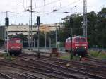 Treffen im Bahnhof Stralsund links steht 115 346-9 und rechts   218 832-4.(28.08.10)  