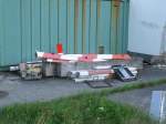 Ausgediente Reste einer Halbschrankenanlage,am 01.September 2013,in Bergen/Rgen.