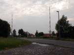 Bahnübergang mit mechanischen Schranken,am 14.September 2014,in Milmersdorf.