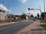 Der Bahnübergang am Bahnhof Britz am 11.September 2016.