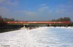 DB 218 465-3 vor Sdostbayernbahn RB 27003 Mnchen - Simbach, KBS 940 Mnchen - Mhldorf, fotografiert auf der Isarbrcke in Mnchen am 14.02.2013