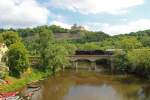 Sonderzug des Eisenbahnmuseums Leipzig zur diesjährigen  Saaleweinmeile . Eine der beiden Lokomotiven war 03 2155-4 von WFL die hier, die Saale überquerend, unterhalb der Rudelsburg zu sehen ist, 24.05.2015.