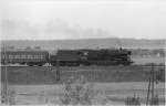 23 1042 vor einem Personenzug Berlin - Dresden nach der Abfahrt in Doberlug - Kirchhain, 1974 