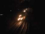 58 311 am 29.01.2001 kurz vor Enkenbach. Wie man sieht hatte der Zug Versptung und der Heizer feuert gerade.