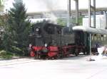 70 083 am 14.07.2012 (anlsslich der 100-Jahr-Feierlichkeiten von Heidelberger Cement) im Zementwerk in Burglengenfeld, von wo aus mehrmals tglich mit einer historischen Wagengarnitur Pendelfahrten