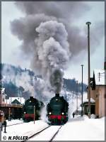 95 1027 mit ihrem Gterzug wird in Steinach von 95 1016 mit einem Personenzug im Februar 1993 berholt