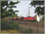 Lok ADAM 9  SEBASTIAN  (Ex-DR 202 520) war am 29.04.2007 im Bauzugeinsatz mit einem Schotterwagenzug am Bahnhof Frankfurt am Main-Niederrad.