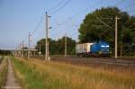 293 026-1 PRESS (202 746-) mit einem Hackschnitzelwaggon bei Rathenow und fuhr in Richtung Stendal weiter. Netten Gru an den Lokfhrer! 04.07.2012