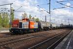 203 144-1 (V160.6) der hvle mit einem Kesselwagenzug in Berlin Schönefeld Flughafen am 26.04.2017