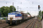 Nach Ankunft in Dormagen drückt 203 764 (zu dem Zeitpunkt für Chemion Im Einsatz) die Wagen in den Übergabebahnhof des Chemparks.