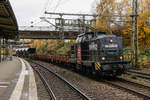 V100 Ost  Wilke  mit Bauzug in Hamburg Harburg, am 11.11.2018.