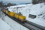 203 316-5 mit etwas Baugermpel in Fahrtrichtung Sden zwischen Sontra und Cornberg. Aufgenommen am 04.02.2010.