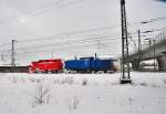 PRESS 203 011 schiebt ihren Schneepflug aus dem Bf Stralsund Richtung Grimmen am 03.02.2010