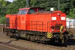 Die 203 115-1 der EBM fhrt durch Kln West am 26.06.2012