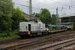 203 007-0 Oak Capital mit einem leeren Autozug am 07.05.2014 in Hamburg Harburg.