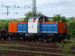 212 132-5 der Nordbayrischen Eisenbahn mit einem Schotterzug in Aachen West am 25.04.2009