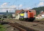 212 297-6 der NBE zieht am 23. Juli 2014 die 1504 001-7 von CargoServ durch Kronach in Richtung Lichtenfels.