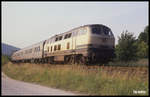 215103 mit E 3120 nach Aschaffenburg am 4.7.1991 um 7.28 Uhr bei Wörth.