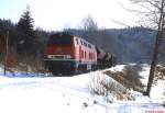 Im Februar 1983 ist 215 061-3 auf der Roßberger Steige nach Bad Wurzach unterwegs.