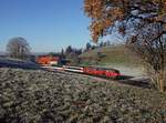 Die 218 423 und die 218 433 mit einem EC nach München am 28.11.2020 unterwegs bei Heimhofen.