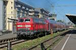 218 436-4 mit den Wagen des RE 5 / 4223, Stuttgart - Lindau-Reutin am 09.08.2022 in Friedrichshafen