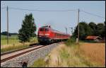 Die 218 241 ist mit einem Regionalzug nach Memmingen unterwegs. Aufgenommen am 07.August 2008 bei Sontheim(Schwab.).