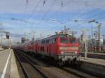 Die 218 400 und eine Weitere am 04.08.2008 mit der 9 Dosto RB bei der Einfahrt in den Mnchner Hbf.