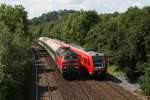 218 485 mit dem Prager und drei 612 begegnen sich am 04.08.2009 bei Hersbruck.