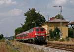 Am 7. August 2009 legt die Kemptener 218 454 mit dem RE 32715 von Ulm nach Kempten (Allgu) in Bad Grnenbach einen kurzen Halt ein.