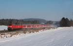 218 491 befrdert am 20.12.2009 einen IRE durch das verschneite Rital bei Ummendorf.