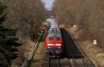 218 341-6 und eine Schwesterlokomotive ziehen am 21.03.2010 bei Heiligenstedten-Julianka einen IC gen Hamburg.