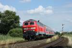 218 452 hat am 6.7.2010 den Bahnhof Baddeckenstedt hinter sich gelassen.