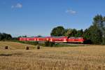 218 104-8 zieht am 5.09.2010 RB 21931 von Kiel Hbf nach Hamburg Hbf bei Lisch gen Sden.