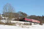 Die 218 387-9 fuhr am 30.01.2011 durch Neerdar, nahe Usseln.