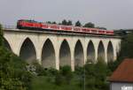 DB 218 390-3 mit RE 3704 Hof - Leipzig, KBS 530 Hof - Leipzig, fotografiert auf dem Viadukt Unterkotzau am 29.05.2010 