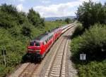 218 419-0 mit einer weiteren 218er und dem EC 194 von Mnchen nach Zrich am 22.07.2012 in der Nhe des Lindauer Ortsteils Schnau.