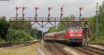 RE 14068 (Bad Harzburg-Hannover Hbf) mit Schublok 218 451-3 bei der Asufahrt Bad Harzburg 9.8.12