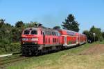 218 298-4 mit einem Regionalexpress nach Frankfurt am 01.08.2012 in Bad Vilbel Gronau