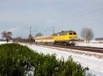 Die 218 392 mit einem Messzug am 12.12.2012 unterwegs bei Langenisarhofen.