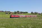 218 461 mit RE 57504 am 18.05.2014 bei Seeg.