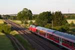 Das ist noch richtige Eisenbahn! Eine 218 mit 3 Bn-Wagen auf ihrem Weg von München nach Mühldorf am Abend des 13.06.14 bei Heimstetten.