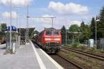 218 345-7 wartet am 12.08.2007 in Ahrensburg auf die Abfahrt als RB nach Hamburg Hbf