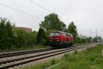 Die Mhldorfer 218 422-4 durchfuhr am 13.05.10 bei dsterem Wetter als Lz Richtung Mnchen den Ort Poing.