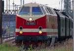 Lok 119 158  in Neubrandenburg mit einer Überführung von Reisezugwagen aus dem NETINERA Werk in Neustrelitz. Hier fährt der Zug in Richtung Pasewalk und weiter bis Berlin. - 17.05.2013