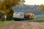 V270.09  des Typ´s V200.01 der SGL (Schienen-Gter-Logistik GmbH) mit einem kurzem Bauzug auf der KBS 612 (Kassel Obervellmar- Korbach) aufgrund von Bauarbeiten fr einen Begegnungsbahnhof zwischen Bad Arolsen und Volkmarsen am Sonntag Morgen den 20/10/13. 